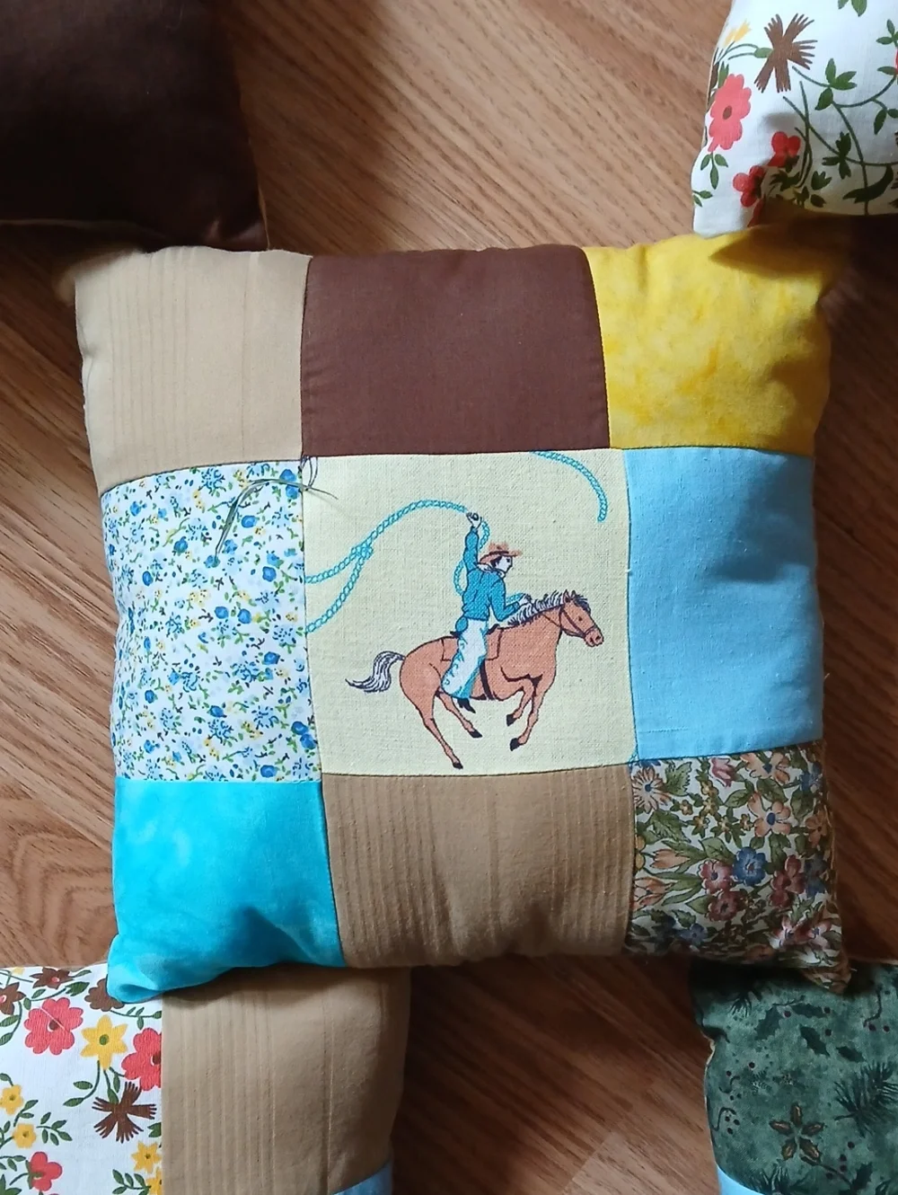 Patchwork Cowboy Print Holiday Throw Pillow - Blue, Brown, Yellow
